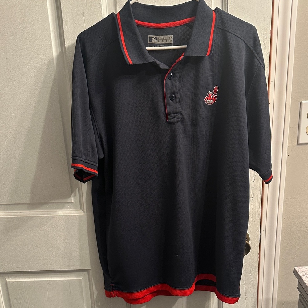 Cleveland Indians Guardians chief wahoo navy blue polo with red trim. Large